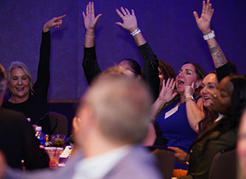 People celebrating at a recent OPO event.