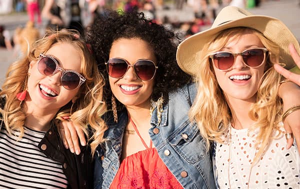 Happy ladies with sunglasses.
