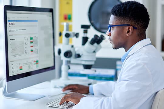 Researcher using a computer for web training.